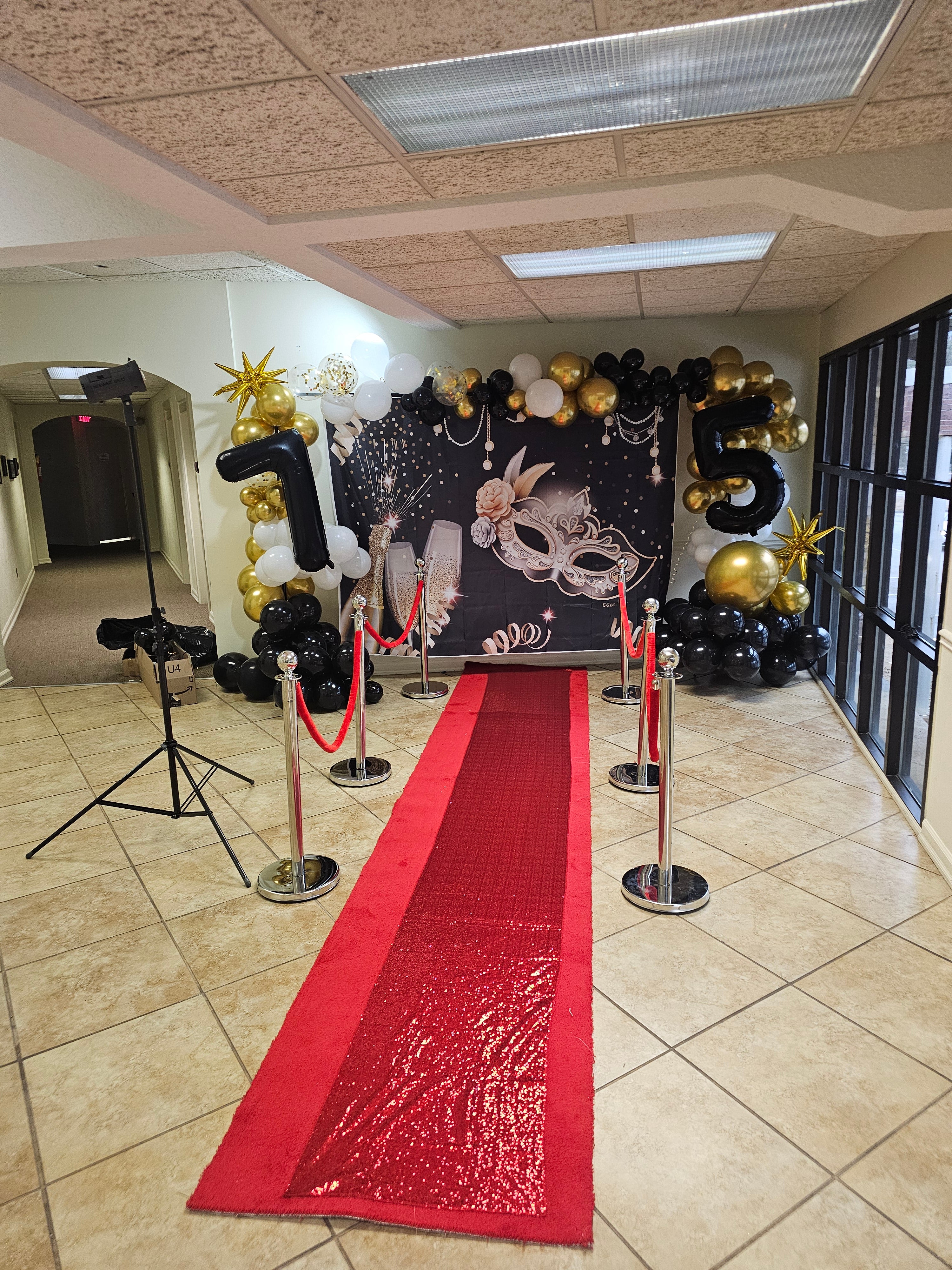 Red carpet  with velvet ropes and poles